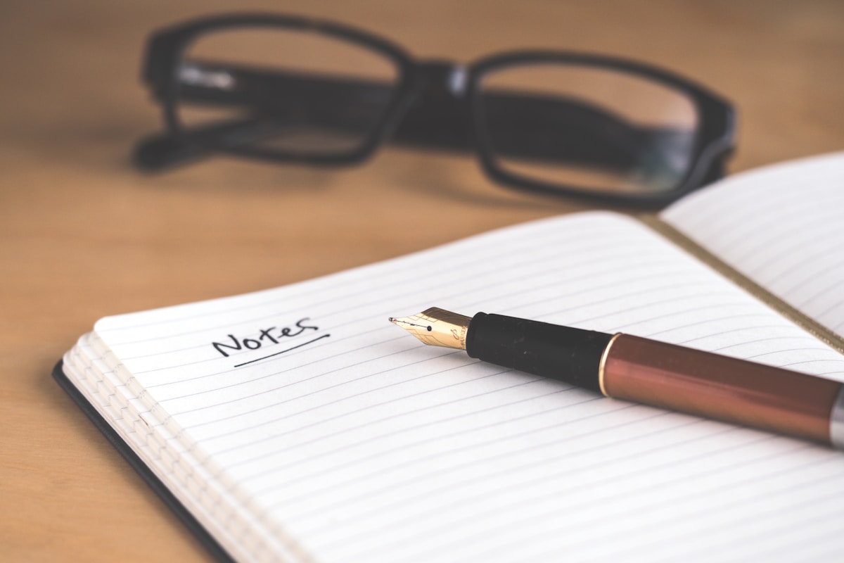Journal and pen for reflective writing between counselling sessions